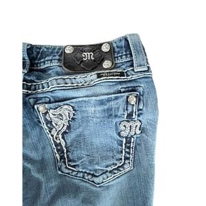 miss me boot cut womans jeans size 29 (missing a rivet on the black Leather)